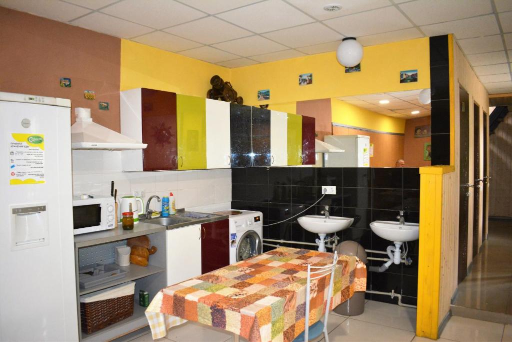 Kuchyň nebo kuchyňský kout v ubytování Sweetdream Hostel