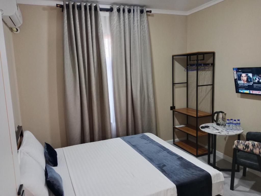 Ένα ή περισσότερα κρεβάτια σε δωμάτιο στο Hotel S & D Hostel