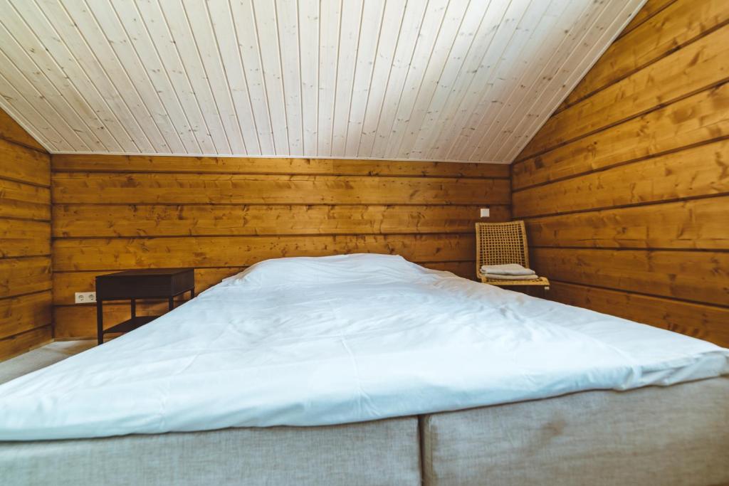 Postel nebo postele na pokoji v ubytování Rannatamme Villa