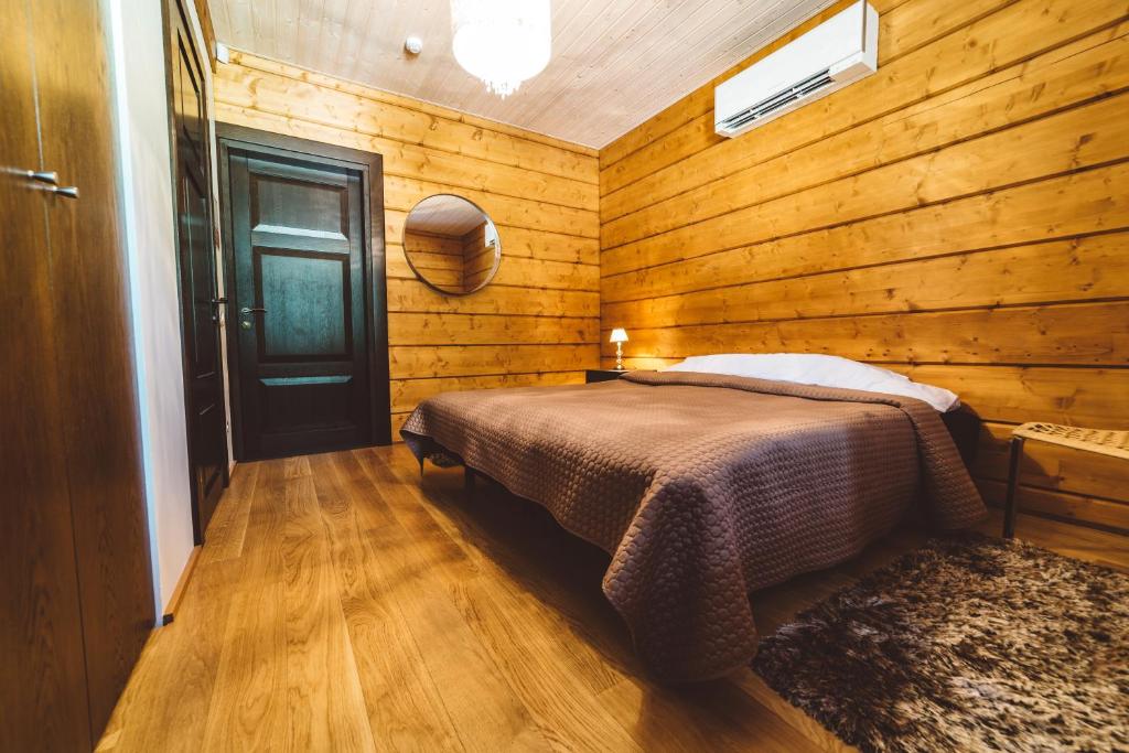 Postel nebo postele na pokoji v ubytování Rannatamme Villa