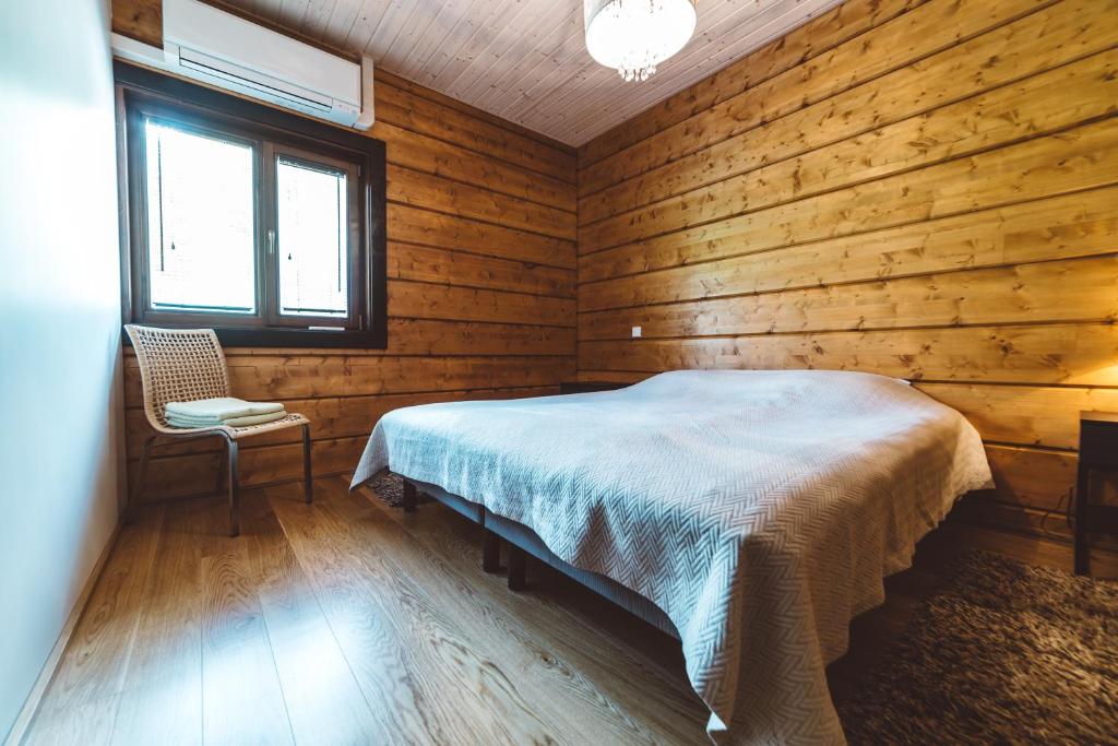 Postel nebo postele na pokoji v ubytování Rannatamme Villa