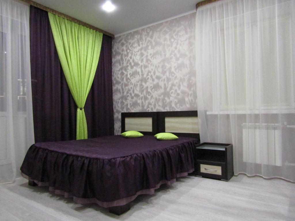 Una habitación de Apartments on Montazhnikov 55