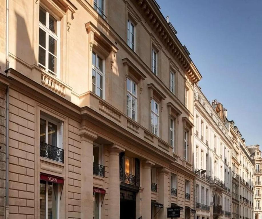 a large building on the side of a street at WS Louvre - Saint-Florentin in Paris
