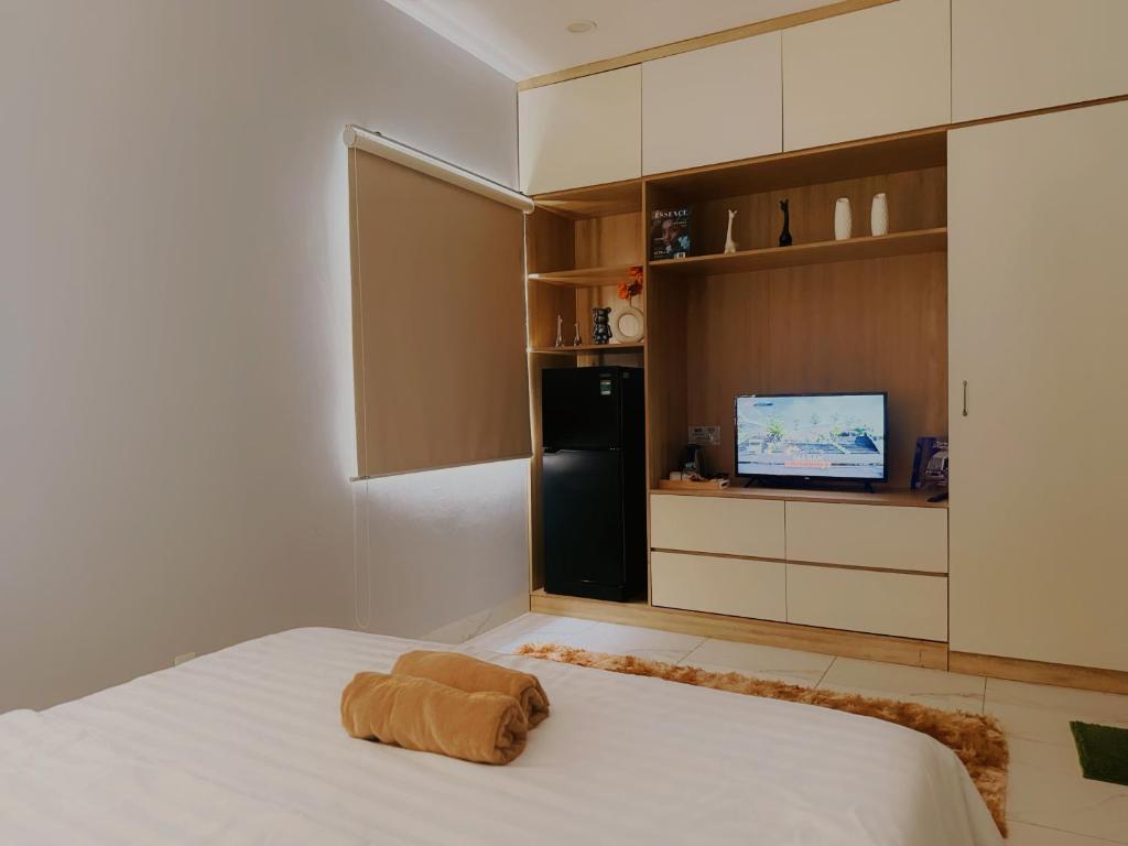 Ένα ή περισσότερα κρεβάτια σε δωμάτιο στο LV TPHomes