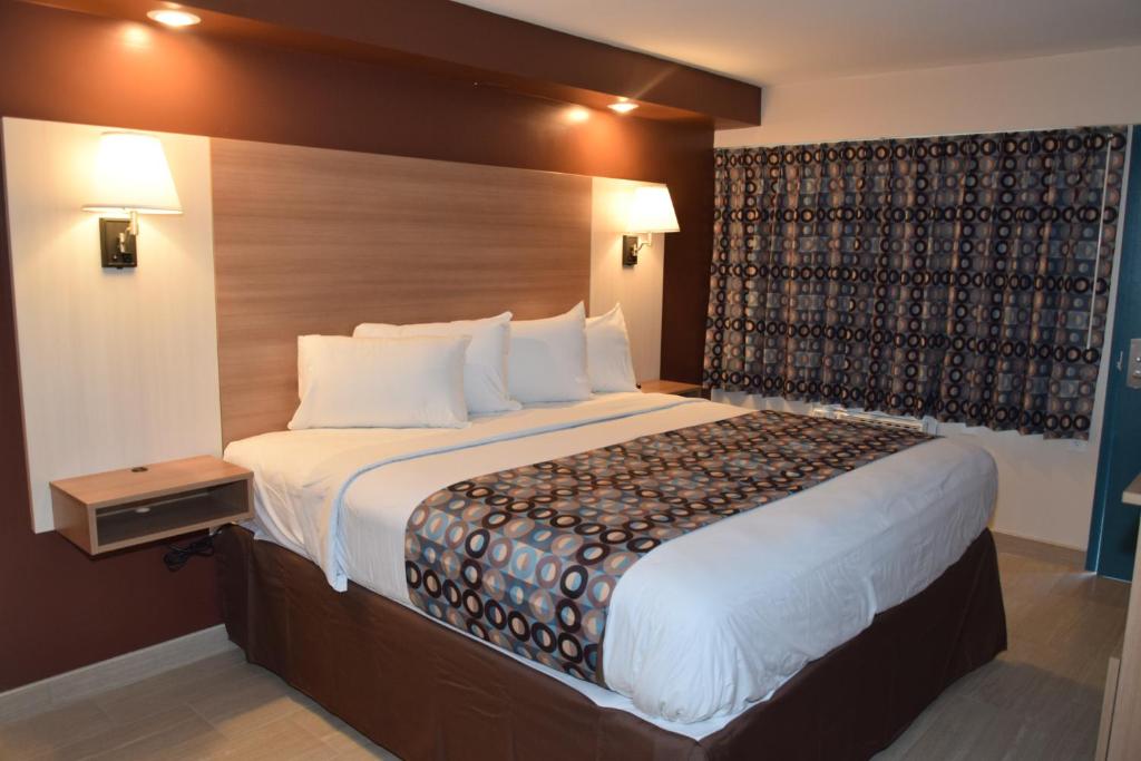 Postel nebo postele na pokoji v ubytování Seahorse Inn