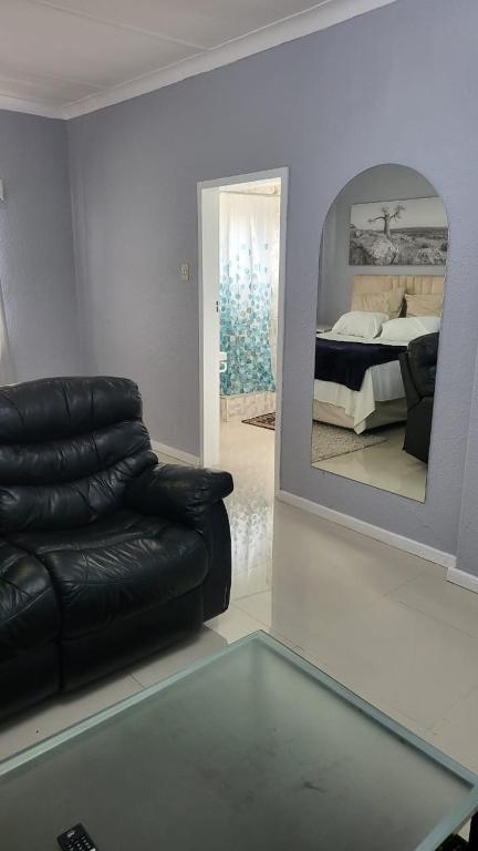 Postel nebo postele na pokoji v ubytování Vasco Geusthouse