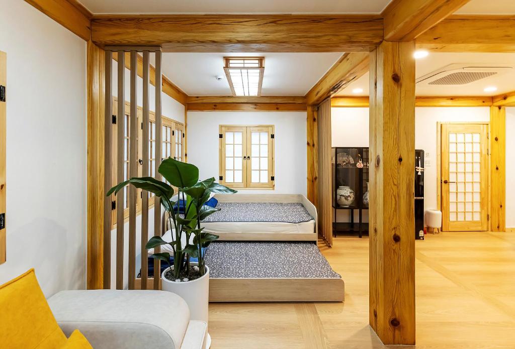 Postel nebo postele na pokoji v ubytování Insarang