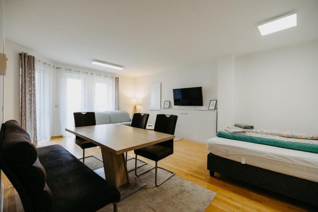 Μια τηλεόραση ή/και κέντρο ψυχαγωγίας στο Ferienwohnung Dado