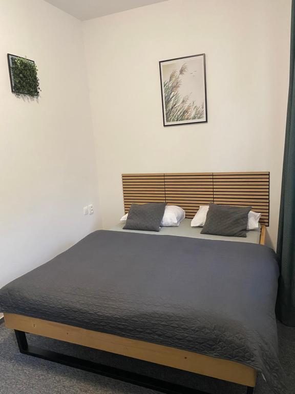 Postel nebo postele na pokoji v ubytování Natura