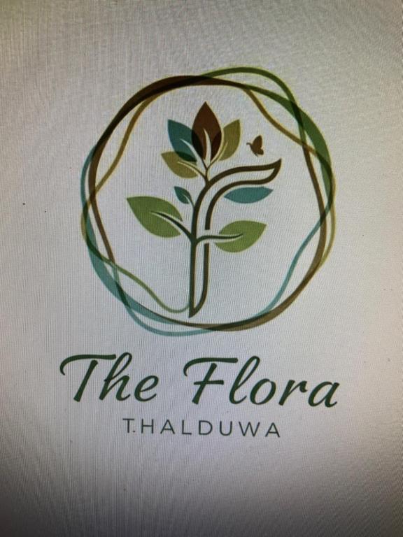 un logotipo para el floro thiruvananthapuramarmaarmaarma en The Flora, en Ahangama