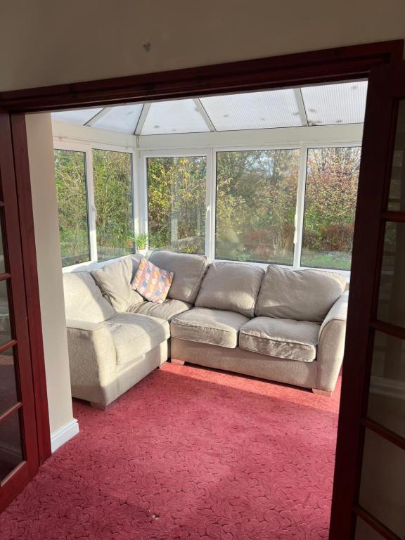 Ein Sitzbereich in der Unterkunft The Holm