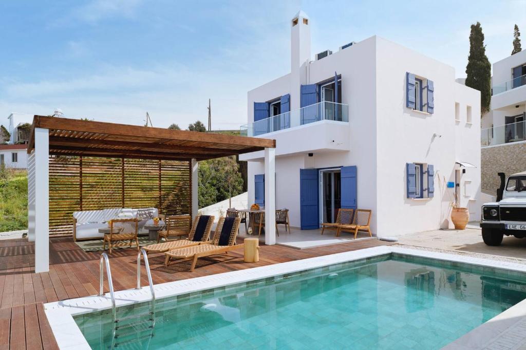 Bazén v ubytování Villa Paradise Coastal Calm at Moonlight Villas nebo v jeho okolí