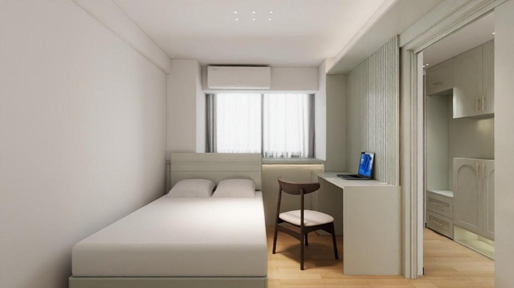 Ένα ή περισσότερα κρεβάτια σε δωμάτιο στο domo plus 熊本公寓 3F 2LDK