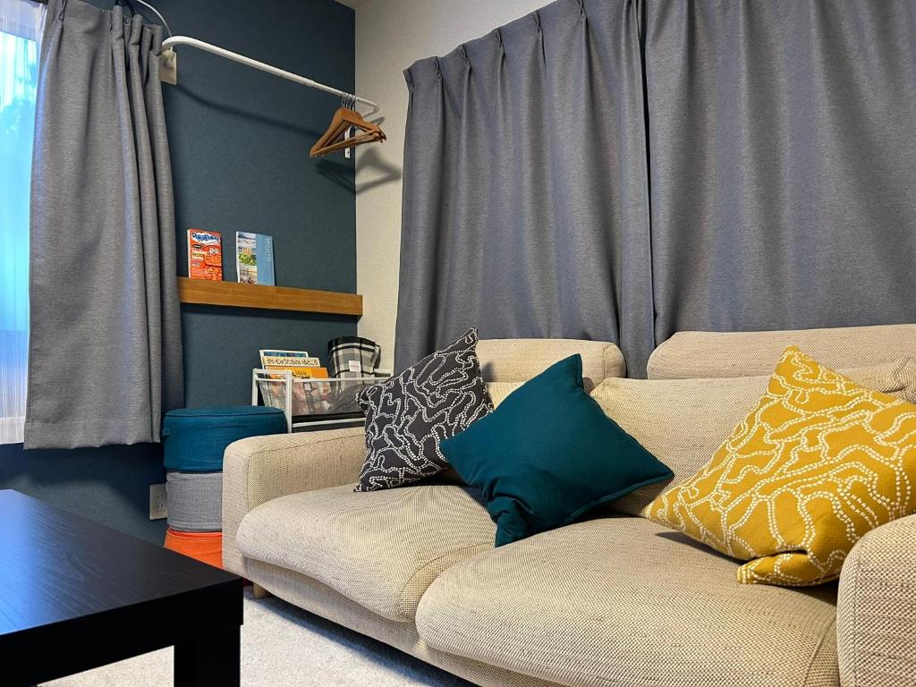 Χώρος καθιστικού στο 島めぐりに便利な一棟貸切宿あぽわん