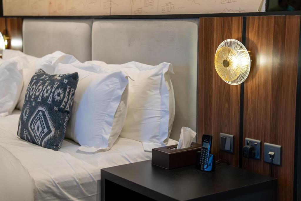 Ένα ή περισσότερα κρεβάτια σε δωμάτιο στο Jovan suites