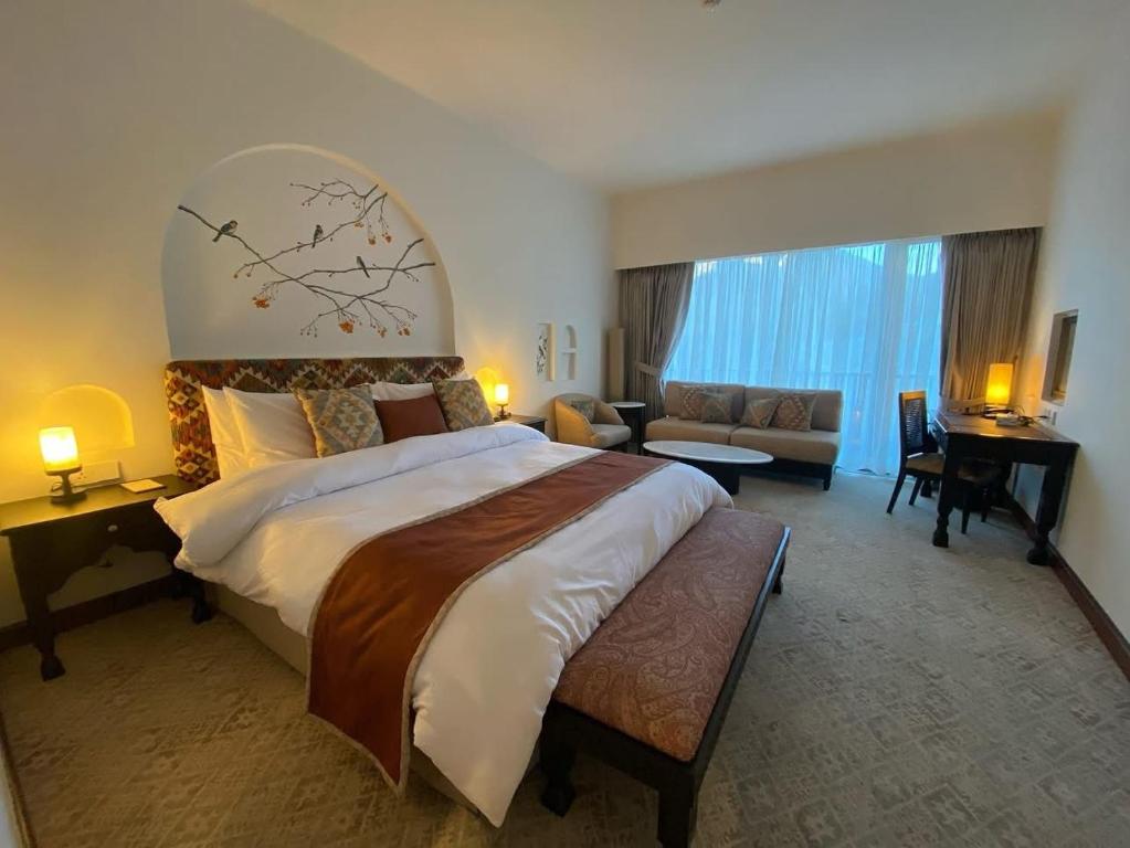 Postel nebo postele na pokoji v ubytování Sost Serena Hotel