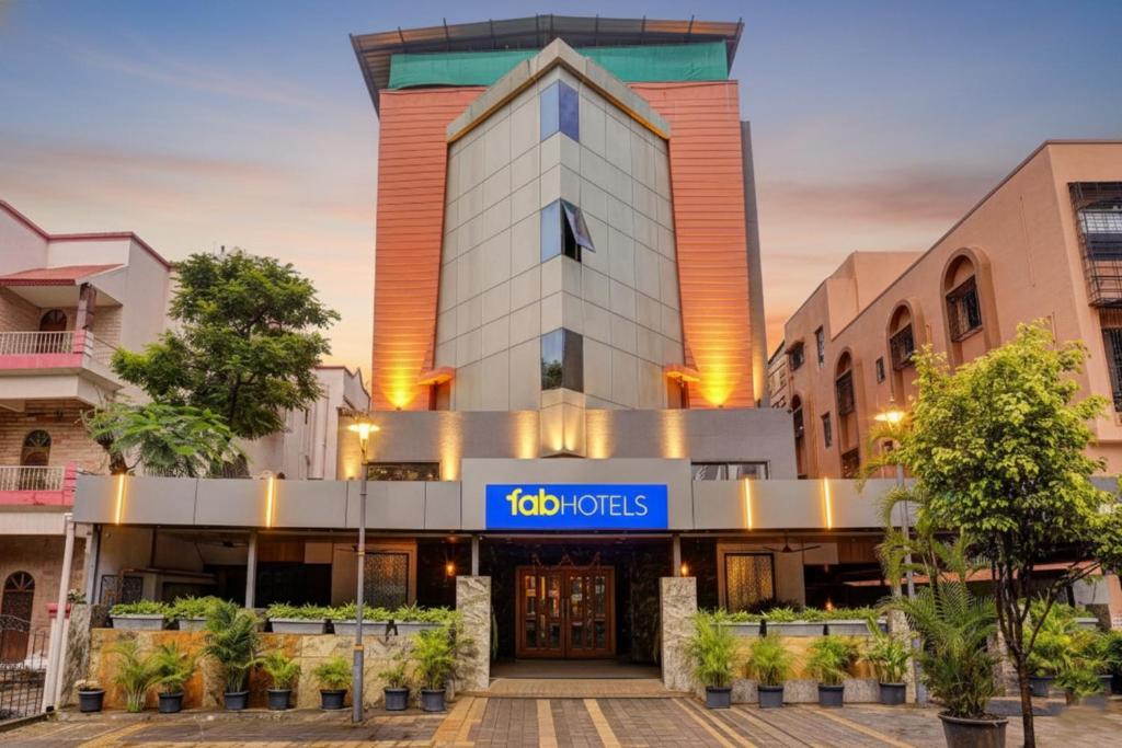 a building with a too works sign in front of it at FabHotel Ratna Regency in Chinchwad