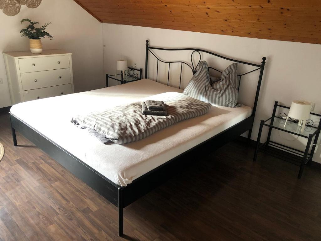 Postel nebo postele na pokoji v ubytování Mühlebach Apartment