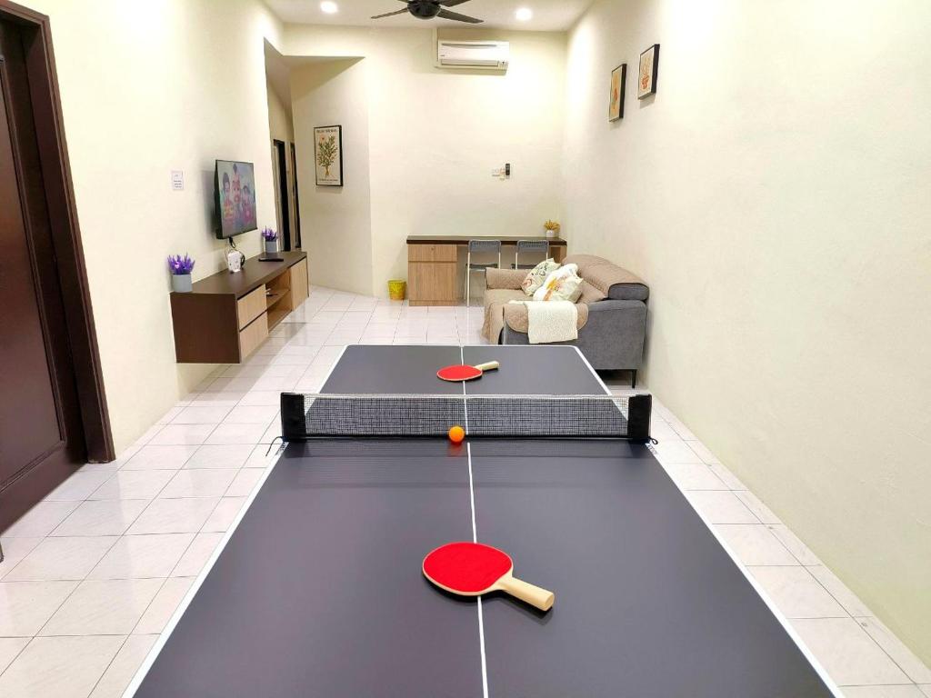 Ένα ή περισσότερα κρεβάτια σε δωμάτιο στο Lighthouse Tmn Intan 6pax Water Dispenser Neflix Target