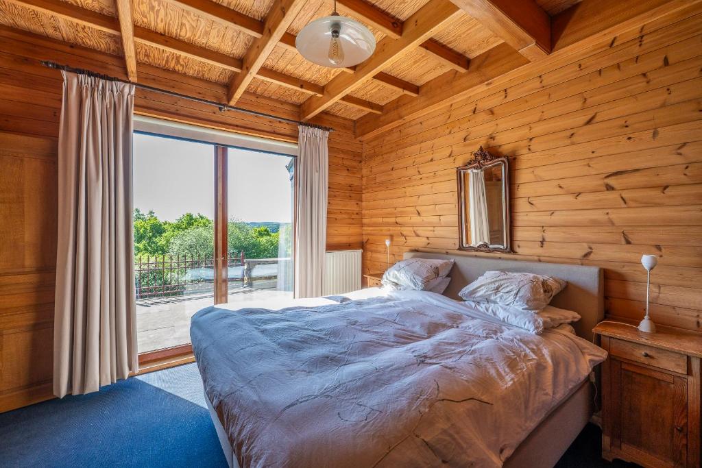 Postel nebo postele na pokoji v ubytování Sous le Cielle d'Ardenne