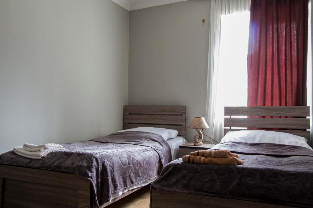 Postel nebo postele na pokoji v ubytování Guesthouse Ori Beli in Mestia