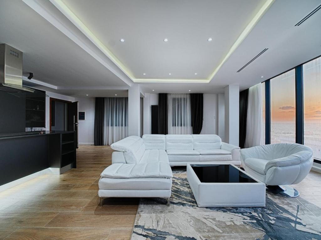 Ένα ή περισσότερα κρεβάτια σε δωμάτιο στο F2 exceptionnel face à la mer