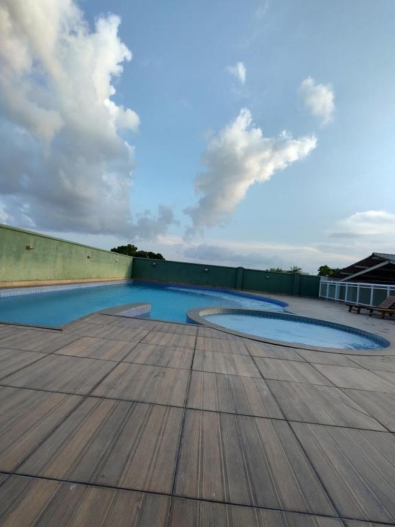 Πισίνα στο ή κοντά στο Cobertura Ilha De Capri