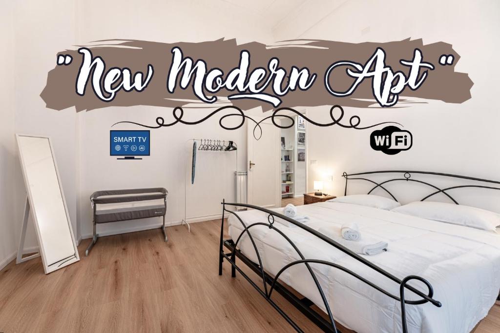 Ένα ή περισσότερα κρεβάτια σε δωμάτιο στο New Modern Apt- Center 10min - Hiper WiFi - A-C
