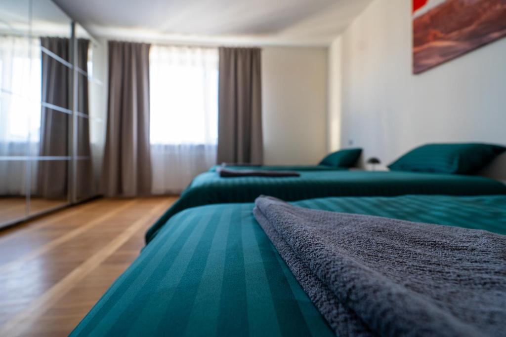 Ένα ή περισσότερα κρεβάτια σε δωμάτιο στο Julias's House