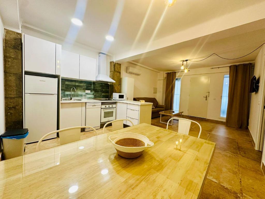 Kuchyň nebo kuchyňský kout v ubytování Las Arenas del Coliseo