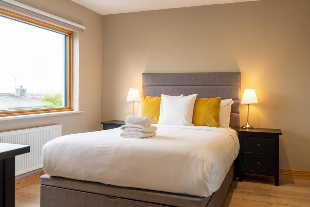 Ένα ή περισσότερα κρεβάτια σε δωμάτιο στο GuestReady - Quiet Retreat in Suburbs