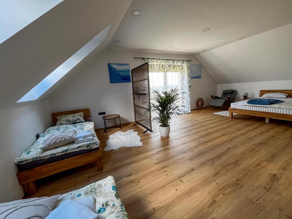 Postel nebo postele na pokoji v ubytování Vila Vinita