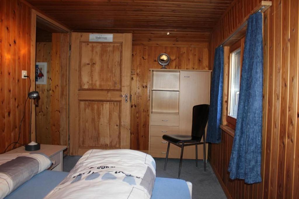 Ένα ή περισσότερα κρεβάτια σε δωμάτιο στο Fäsch