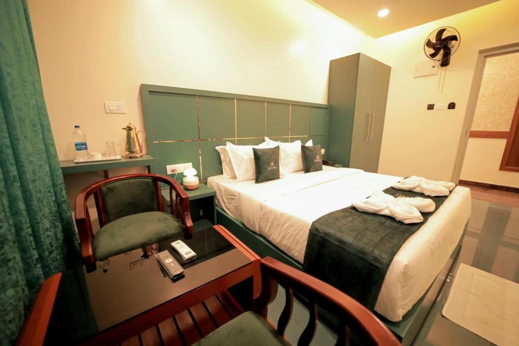 Ένα ή περισσότερα κρεβάτια σε δωμάτιο στο LUMARISE Hotel