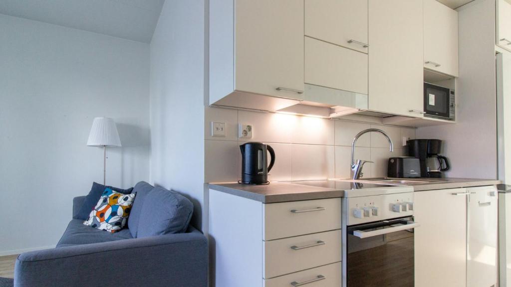 Η κουζίνα ή μικρή κουζίνα στο Central Apartment for 3