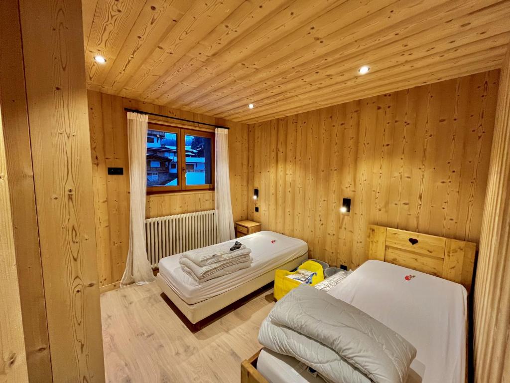 Postel nebo postele na pokoji v ubytování Résidences Delavay La Cordée