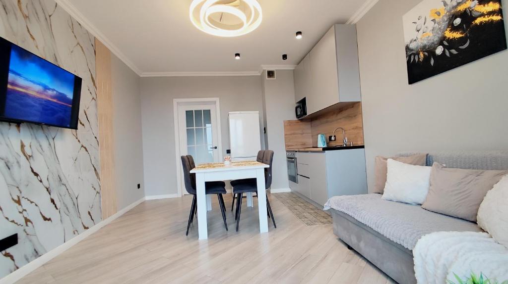 Küche/Küchenzeile in der Unterkunft ЖК "Nomad" 2-комнатный ЛЮКС в центре города