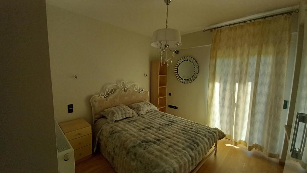 Postel nebo postele na pokoji v ubytování Elegant Vibes - Trikala - 3BD Apt
