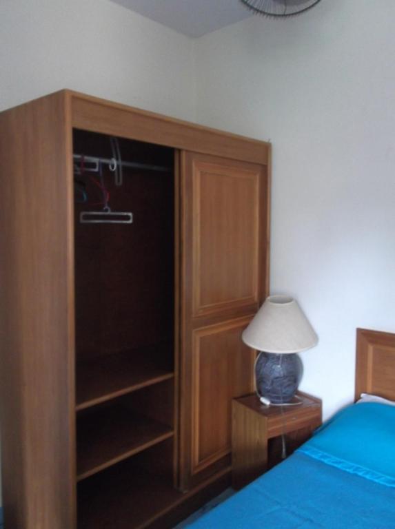Postel nebo postele na pokoji v ubytování Palm Point Village