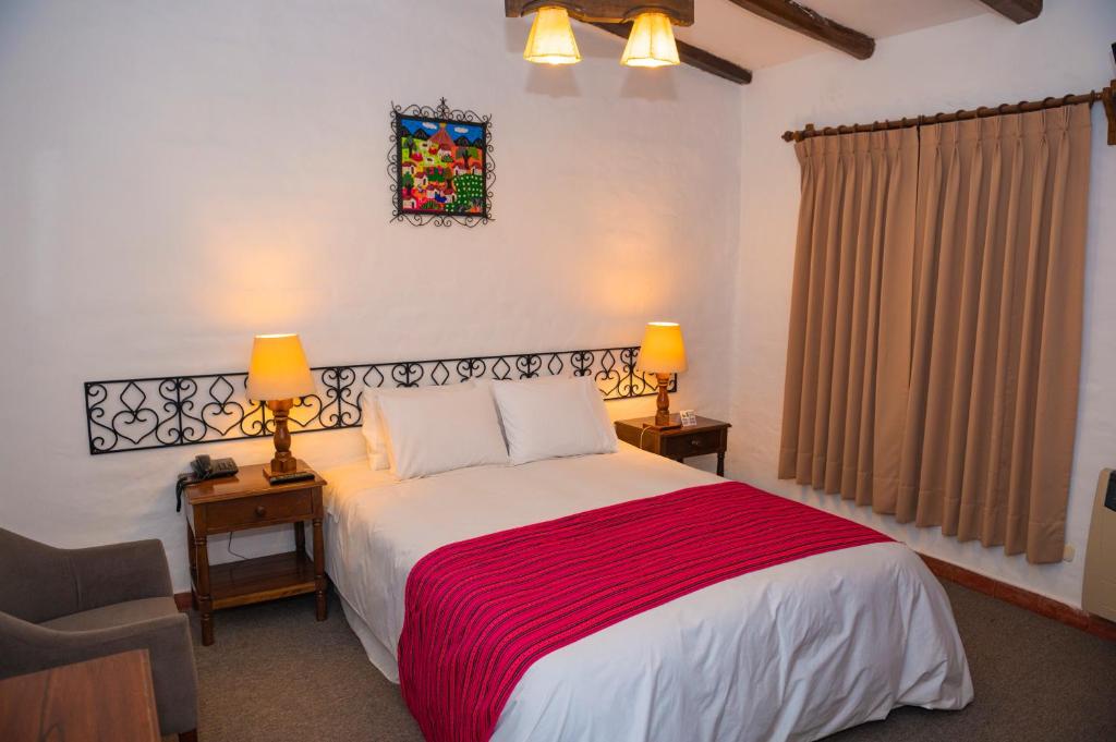 Postel nebo postele na pokoji v ubytování Hotel el Patio de Monterrey