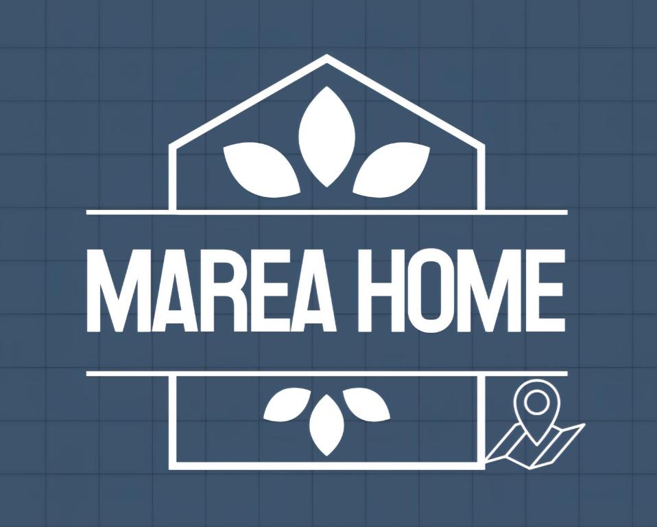 a sign for a mara home with a magnifier at Marea Home in Arraial do Cabo