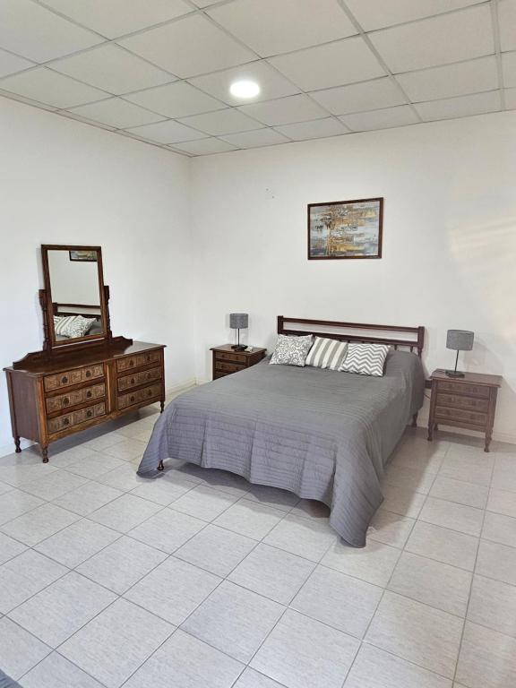 Postel nebo postele na pokoji v ubytování Hermoso departamento en Nogoyá