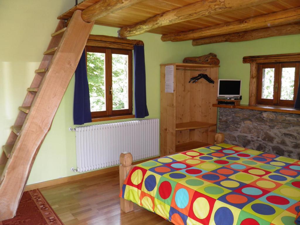 Postel nebo postele na pokoji v ubytování Agriturismo Zertin