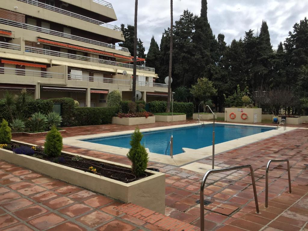 Bazén v ubytovaní Parque Marbella alebo v jeho blízkosti