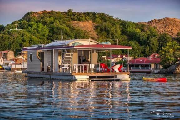 a house boat in the water on a lake at Aqua Lodge, Les Saintes, Terre de Haut, Guadeloupe in Terre-de-Haut
