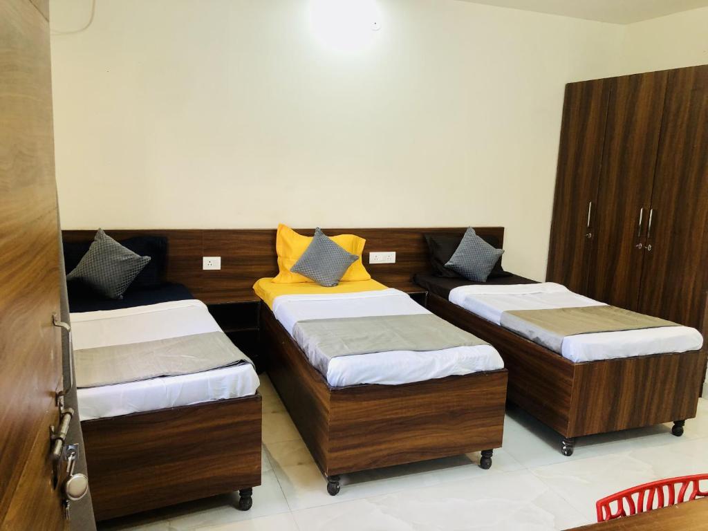 Ένα ή περισσότερα κρεβάτια σε δωμάτιο στο OOAK Knowledge Park