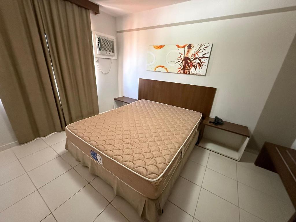 Ένα ή περισσότερα κρεβάτια σε δωμάτιο στο Privé Boulevard Suites Viaje Bem