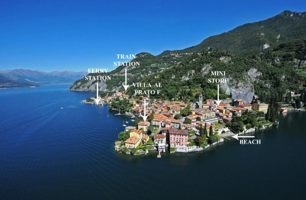 an island in the middle of a body of water at Casa Al Prato Apt. F in Varenna