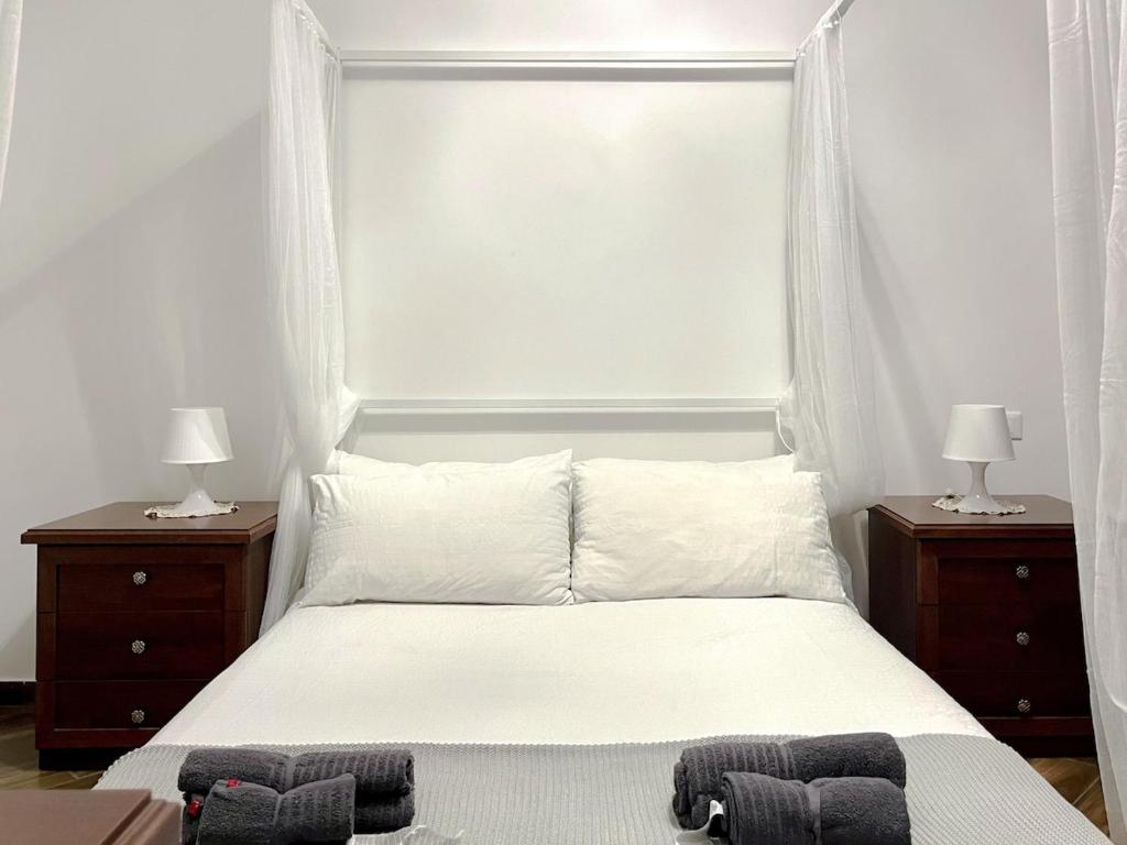 Postel nebo postele na pokoji v ubytování Urban Loft Albano