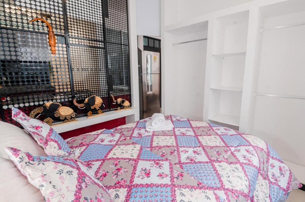 Ένα ή περισσότερα κρεβάτια σε δωμάτιο στο Loft Apartamento en el Corazon de La Vega